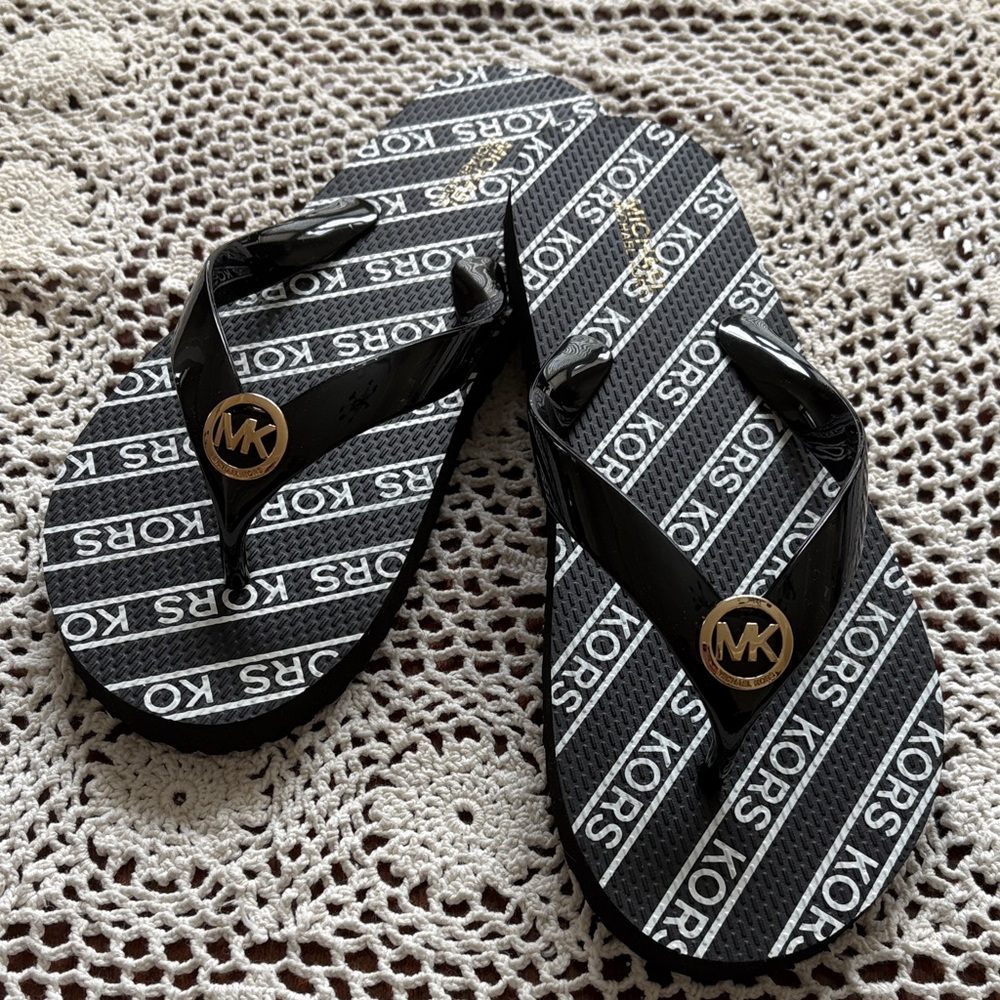 Michael Kors Black and White Flip Flops